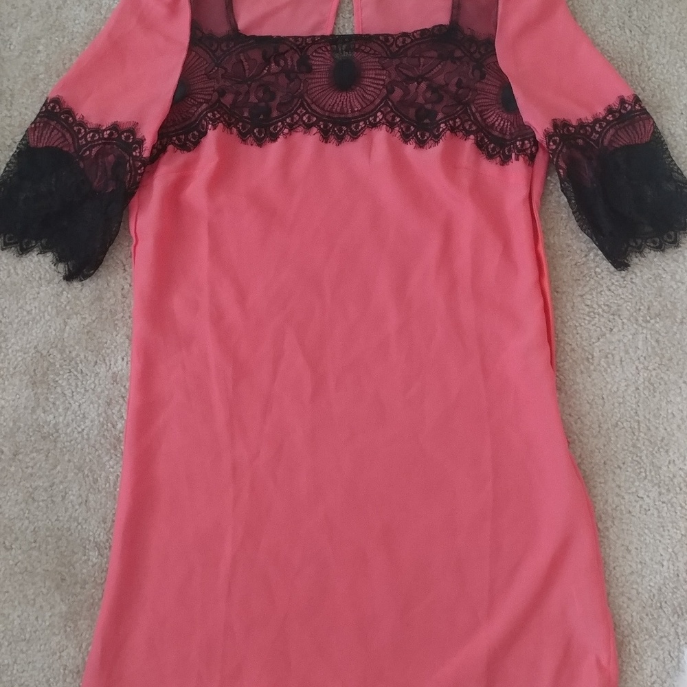 Beautiful coral dress with black lace detailing